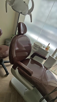 Dental chair photographed inside the clinic